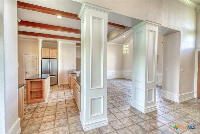 1041 Clarence Rd, Temple, TX 76501 - interior space featuring beam ceiling, ornate columns, and wainscoting
