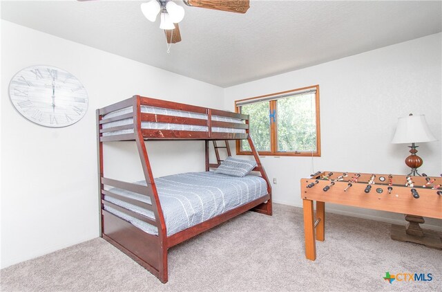 bedroom with carpet and ceiling fan