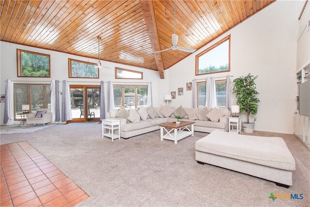 carpeted living room featuring high vaulted ceiling, wooden ceiling, ceiling fan, and plenty of natural light