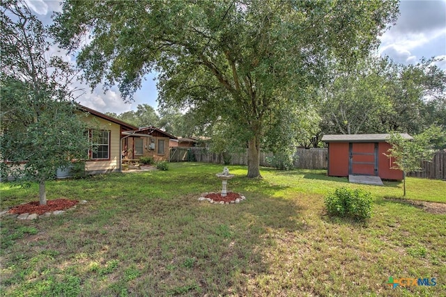 808 E Randall St, Beeville, TX 78102 - fenced backyard featuring a shed