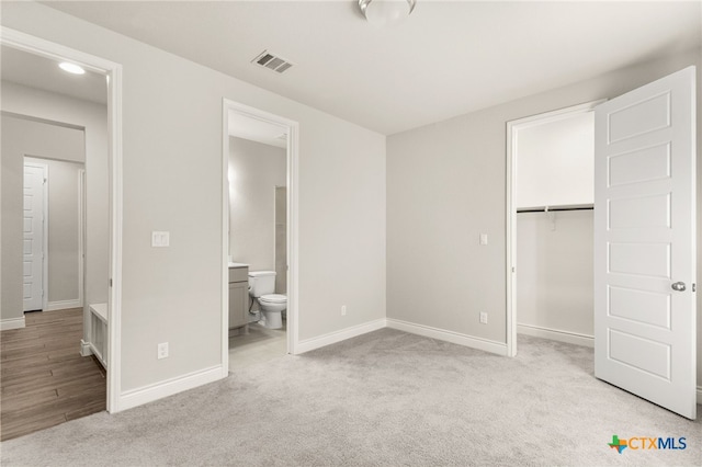 636 Vireos St, New Braunfels, TX 78132 - unfurnished bedroom featuring carpet floors, a closet, connected bathroom, and recessed lighting