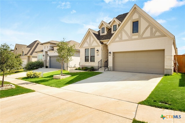 636 Vireos St, New Braunfels, TX 78132 - english style home with concrete driveway, a front lawn, roof with shingles, and stucco siding