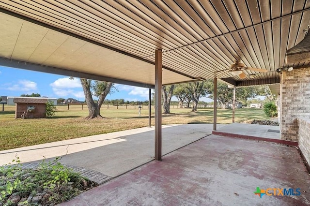 view of patio featuring ceiling fan