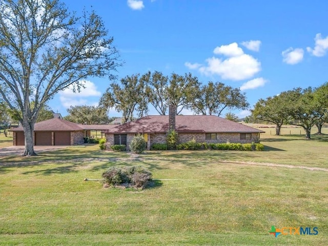 ranch-style house featuring a front lawn