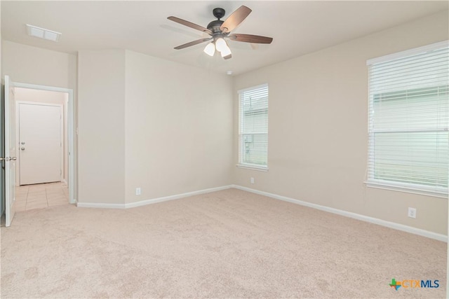 466 Sand Trail St, New Braunfels, TX 78130 - spare room with light colored carpet, a ceiling fan, and baseboards