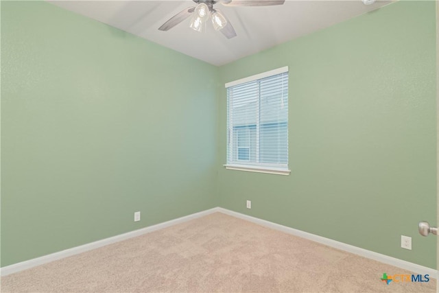 466 Sand Trail St, New Braunfels, TX 78130 - spare room featuring a ceiling fan, light colored carpet, and baseboards