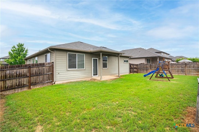 466 Sand Trail St, New Braunfels, TX 78130 - rear view of property with a playground and a patio