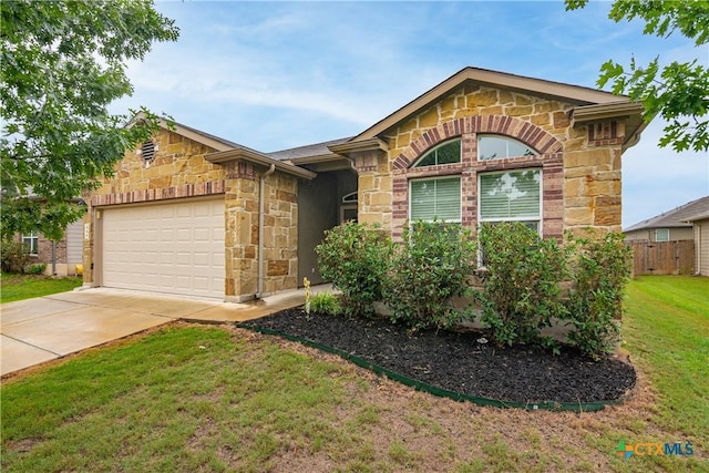 466 Sand Trail St, New Braunfels, TX 78130 - ranch-style home featuring stone siding, a garage, and concrete driveway