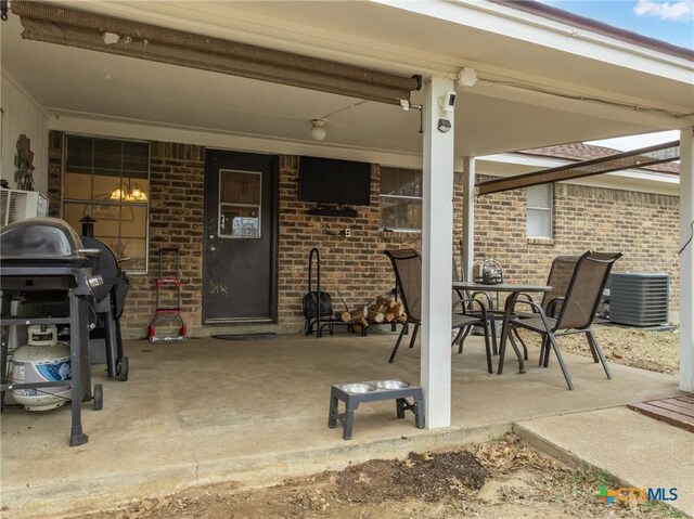 109 E Moonlight Dr, Robinson, TX 76706 - view of patio / terrace featuring a grill and cooling unit