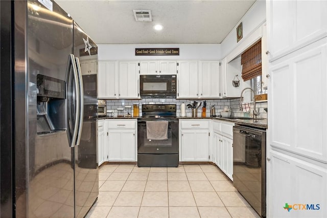 109 E Moonlight Dr, Robinson, TX 76706 - kitchen featuring black appliances, white cabinets, backsplash, and light tile patterned floors