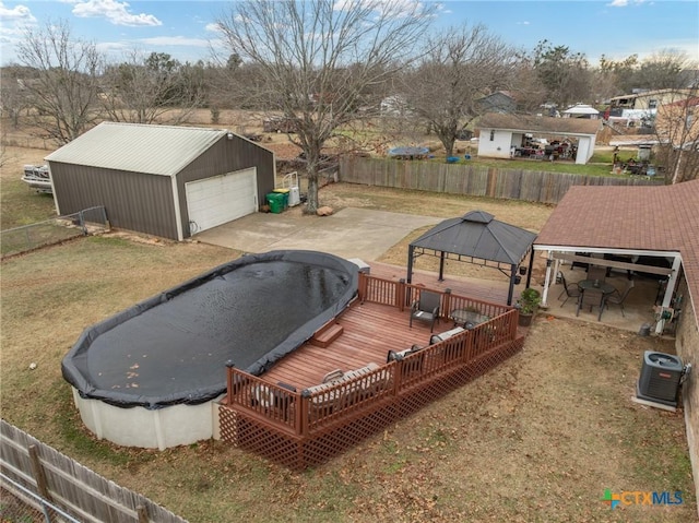 109 E Moonlight Dr, Robinson, TX 76706 - view of yard with a gazebo, a garage, a pool side deck, an outdoor structure, and central air condition unit