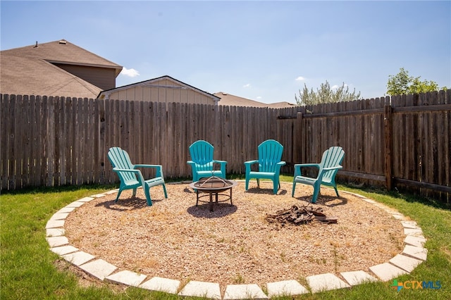 view of yard featuring a fire pit