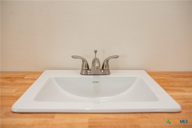 177 Powderhorn Ln, Port Lavaca, TX 77979 - bathroom view of a sink and a textured wall