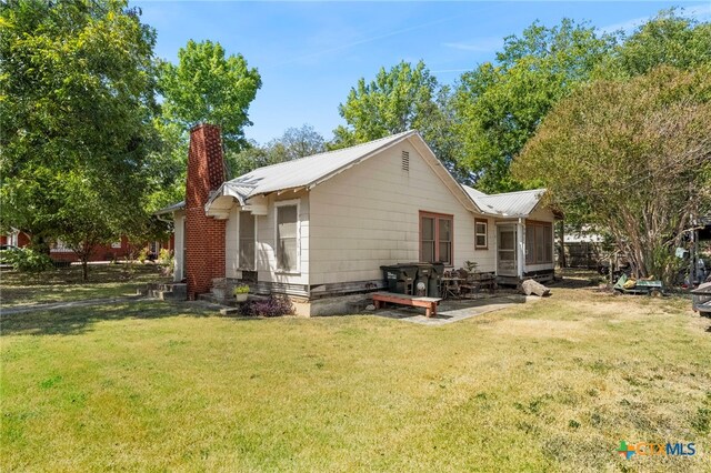 exterior space featuring a yard