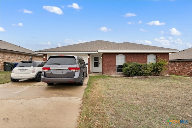 ranch-style home with a front lawn