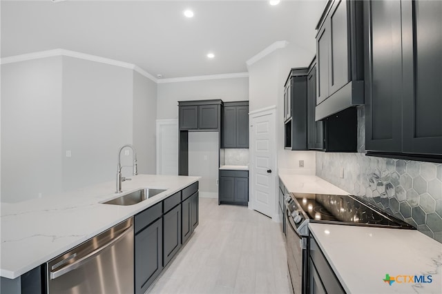 kitchen with decorative backsplash, ornamental molding, light stone countertops, stainless steel appliances, and a sink