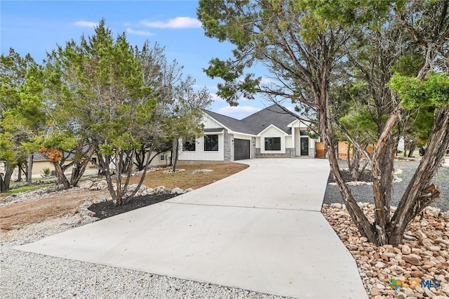 view of front of house with driveway and an attached garage