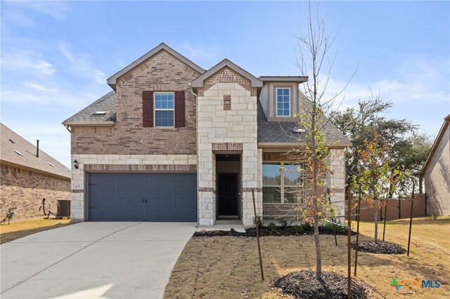 view of front of house with a garage