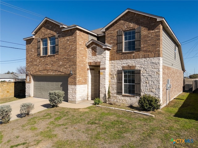 front of property with a front lawn and a garage