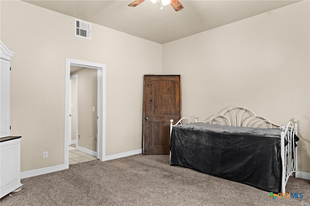 607 S Main St, Lampasas, TX 76550 - carpeted bedroom with baseboards and ceiling fan
