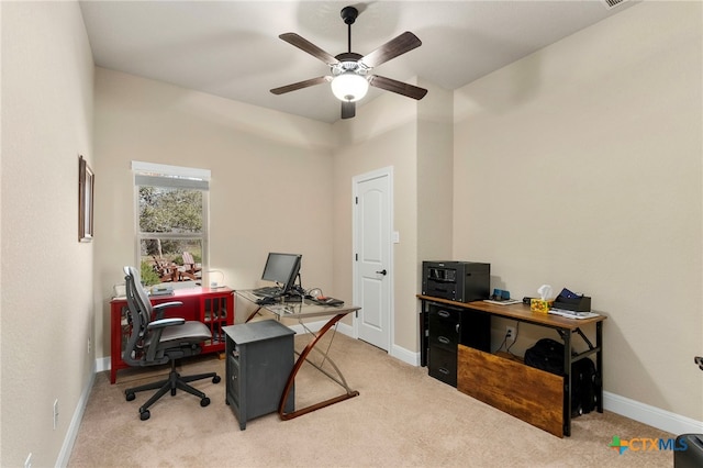 home office featuring ceiling fan, carpet floors, and baseboards