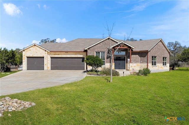 ranch-style house featuring a garage, driveway, a shingled roof, brick siding, and a front yard