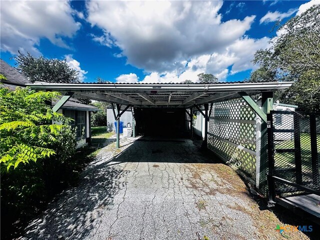 201 Maple St, Yoakum, TX 77995 - view of car parking with driveway and fence