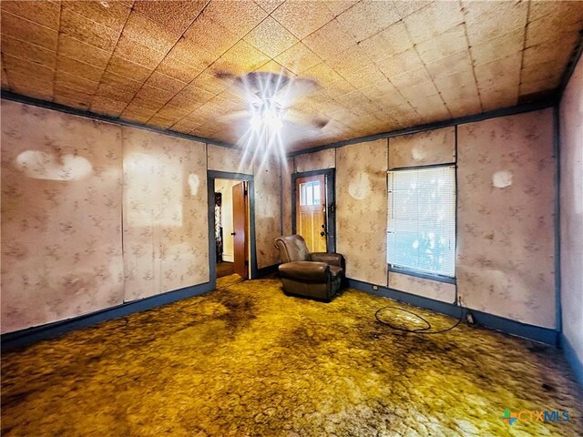 201 Maple St, Yoakum, TX 77995 - unfurnished room featuring baseboards and ceiling fan