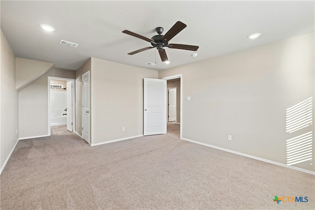 unfurnished bedroom with light colored carpet and ceiling fan