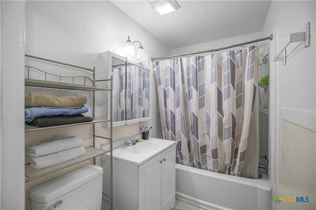 205 E Johnson St, Cuero, TX 77954 - bathroom with vanity, shower / bath combination with curtain, and toilet