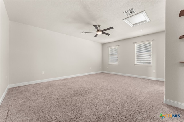 216 Gulfton St, Lakeway, TX 78738 - empty room featuring light carpet and a ceiling fan