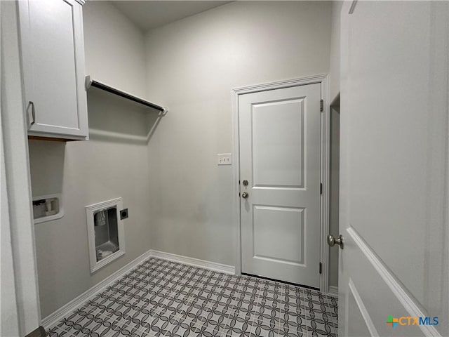 laundry area featuring cabinets, washer hookup, and electric dryer hookup