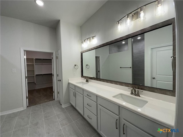 bathroom with vanity and tile patterned floors