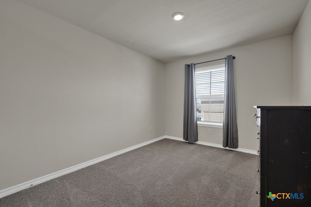 view of carpeted spare room