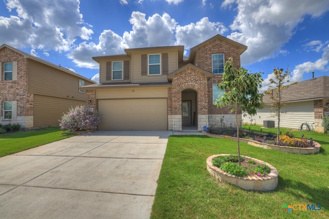 view of property with central AC, a garage, and a front lawn