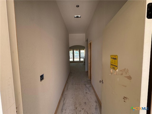 hallway with arched walkways