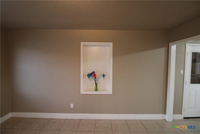 washroom with light tile patterned floors