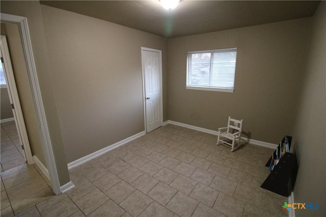 view of tiled spare room