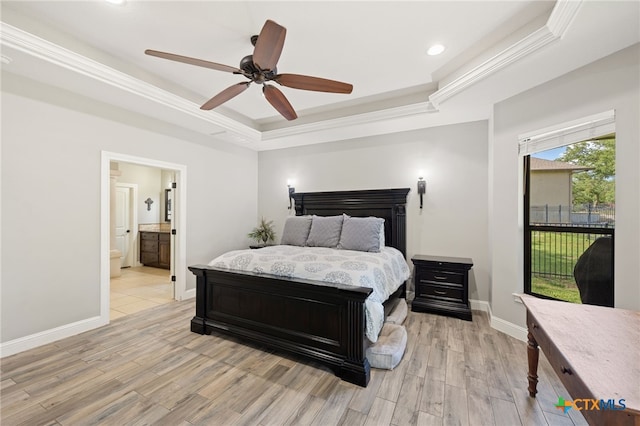 1448 Decanter Dr, New Braunfels, TX 78132 - bedroom featuring a tray ceiling, light wood finished floors, recessed lighting, connected bathroom, and access to outside