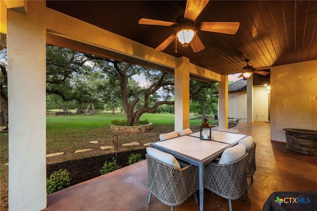 1448 Decanter Dr, New Braunfels, TX 78132 - view of patio featuring a ceiling fan and outdoor dining space