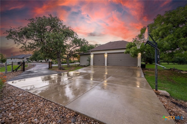 1448 Decanter Dr, New Braunfels, TX 78132 - view of front of home featuring a gate, concrete driveway, and a garage