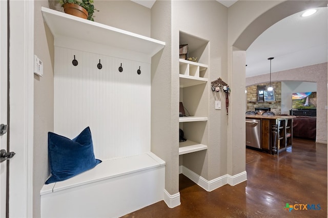 1448 Decanter Dr, New Braunfels, TX 78132 - mudroom with arched walkways and finished concrete floors