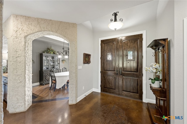 1448 Decanter Dr, New Braunfels, TX 78132 - entryway featuring concrete floors and arched walkways