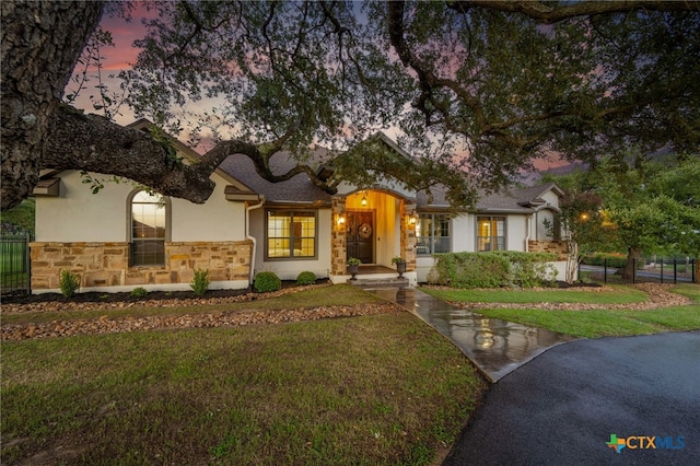 1448 Decanter Dr, New Braunfels, TX 78132 - view of front of house with stone siding and stucco siding