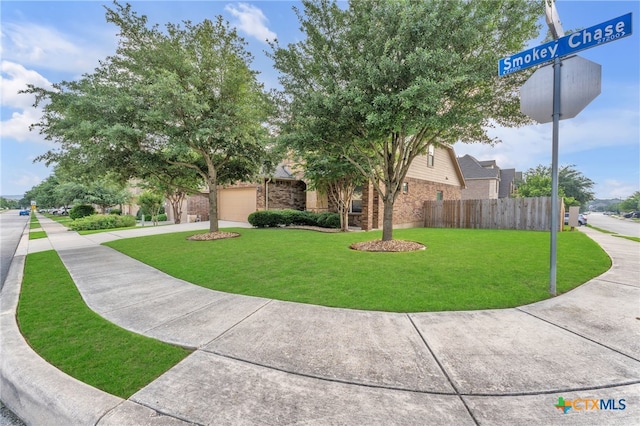 view of front facade with a front yard