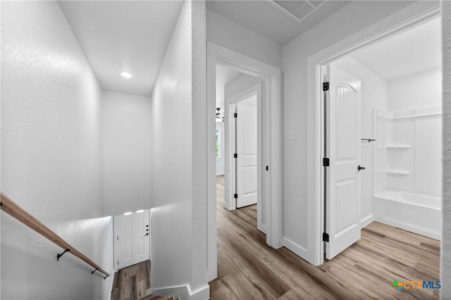 614 S 24th St, Temple, TX 76501 - hall with wood finished floors and baseboards