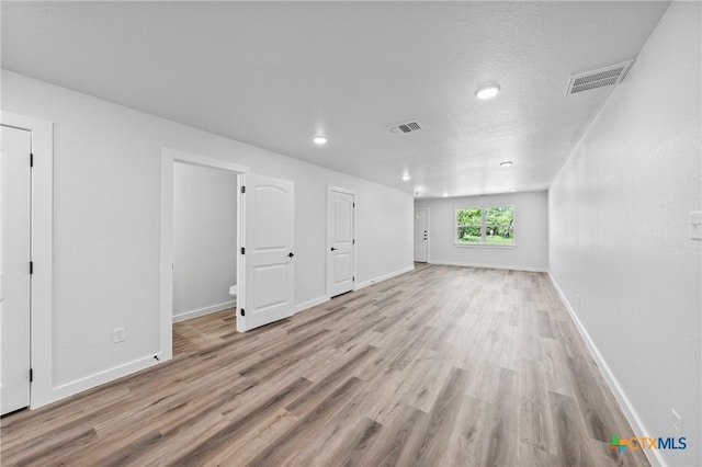 614 S 24th St, Temple, TX 76501 - below grade area featuring light wood-type flooring, recessed lighting, and baseboards