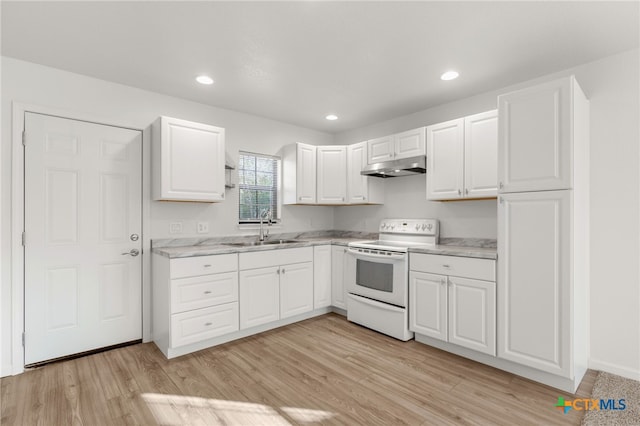 kitchen featuring light wood-style flooring, white range with electric cooktop, a sink, under cabinet range hood, and white cabinetry