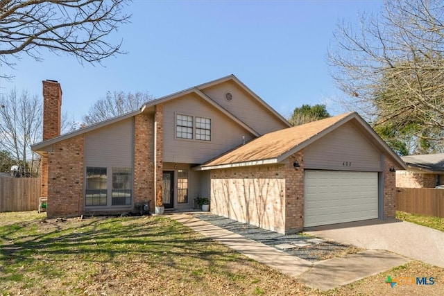 front facade featuring a garage and a front lawn