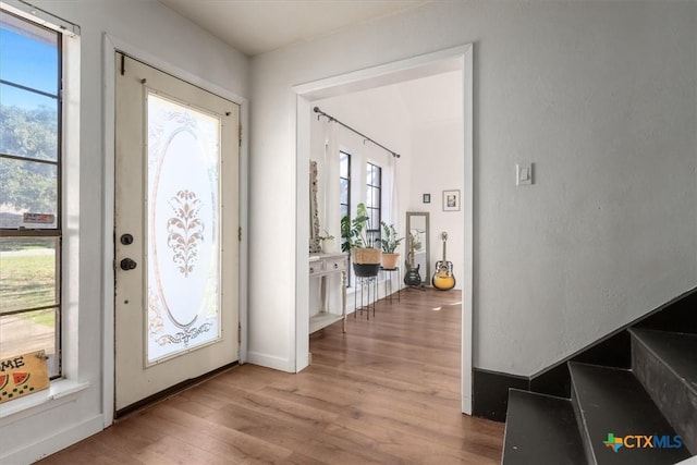 foyer with light wood-type flooring